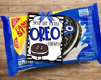 a bag of oreo cookies sitting on top of a wooden table