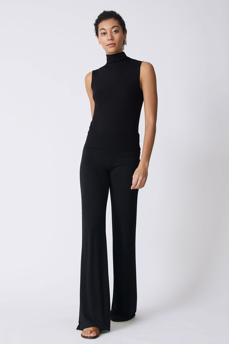 For an elegant look this Spring, our Zoe Jersey Wide Leg pant is the perfect answer. Made in our bamboo jersey, this style can be dressed up with our matching Alina Top. Wide, foldable waistband, wide leg shape, clean finish hem - 95% Bamboo Rayon, 5% Spandex - Made in NYC - Dry clean or machine wash - Our model is 5'9" wearing size S - Waist 29", Total Rise 13", Inseam 35", Leg Opening 25" Orders are processed within three business days (not including weekends or holidays). All pre-orders are c Black Full Length Viscose Bottoms, Elegant Stretch Wide Leg Viscose Pants, Versatile Stretch Viscose Pants, Elegant Stretch Viscose Wide Leg Pants, Elegant Stretch Viscose Pants, Chic Stretch Modal Bottoms, Fitted Viscose Bottoms For Loungewear, Fitted Wide Leg Viscose Pants, Elegant Black Wide Leg Viscose Pants