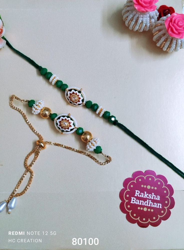 three different necklaces with flowers and pearls on the bottom one is green, the other is white