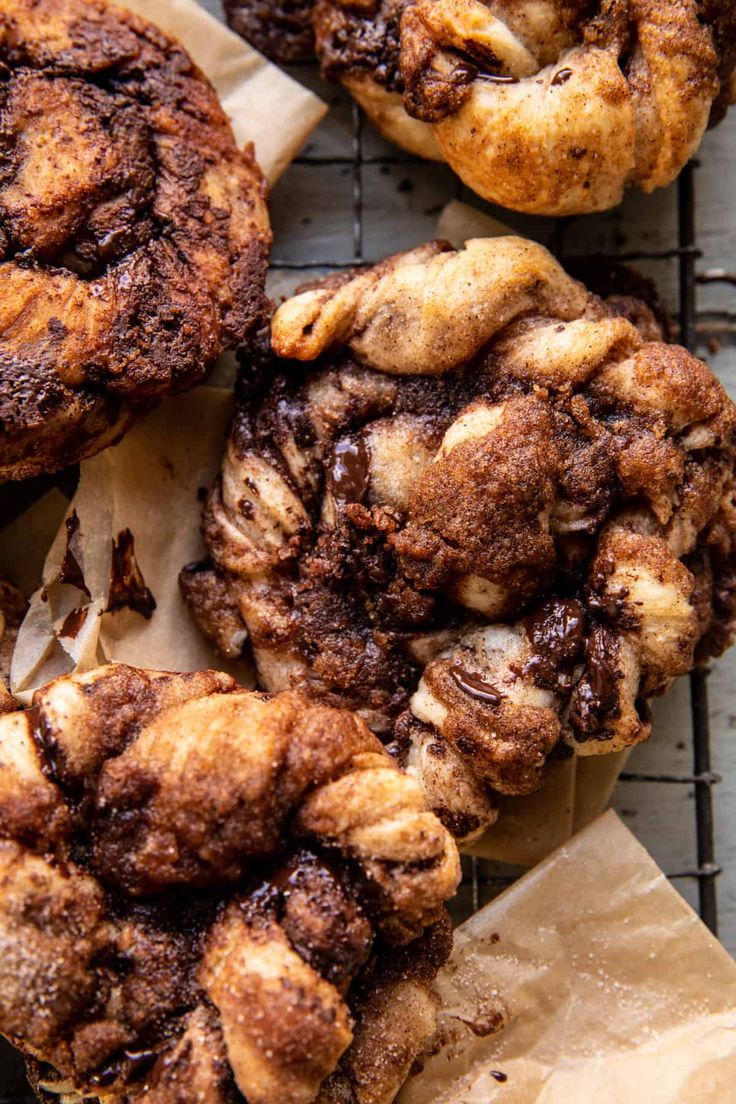 chocolate crinkle cookies sitting on top of brown paper