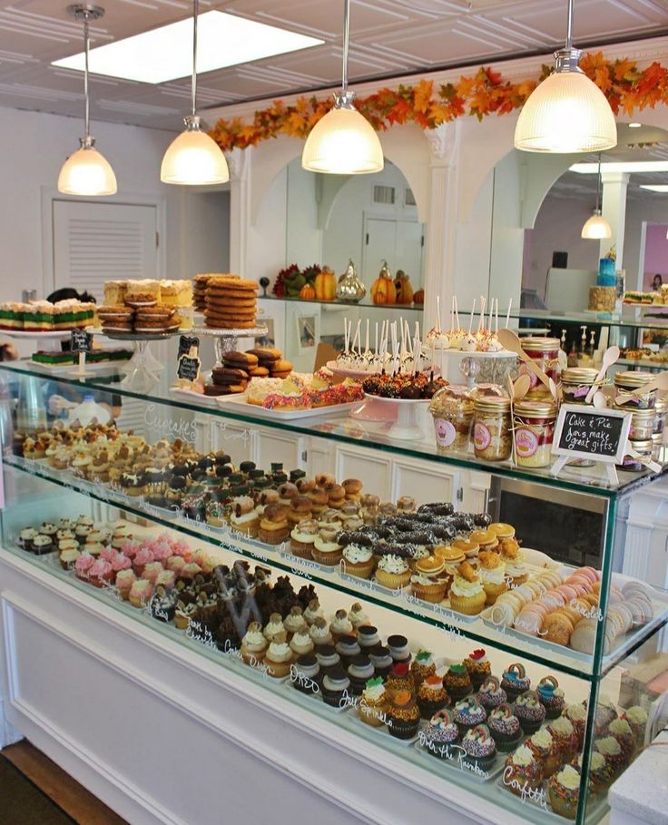 a bakery filled with lots of different types of donuts