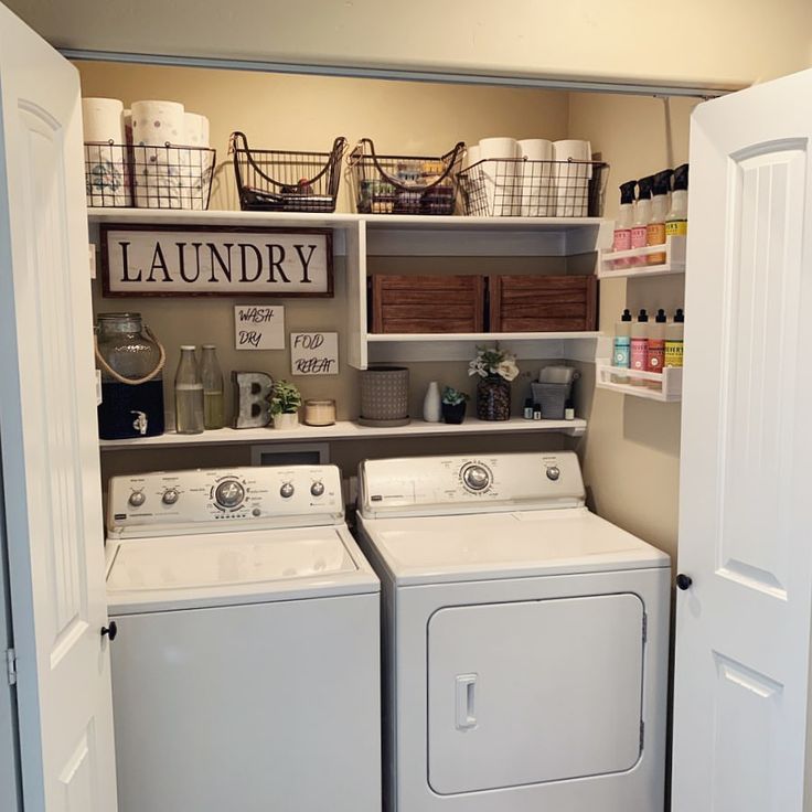 a washer and dryer in a small laundry room