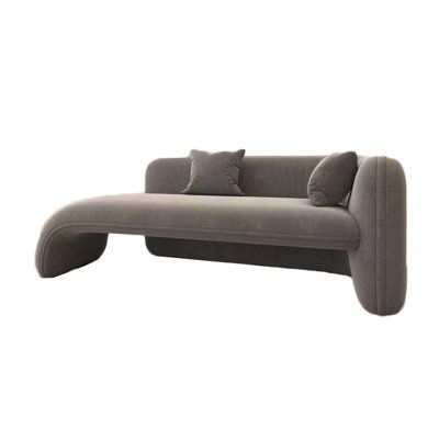 a gray couch with two pillows on it's back and one arm extended to the side