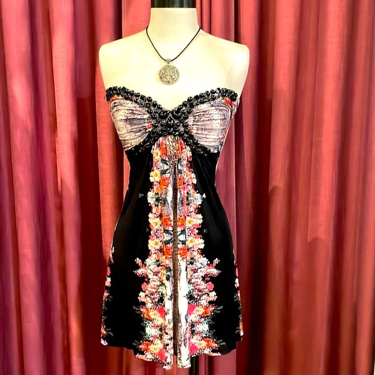 Gorgeous Black Flowered Multi Print Strapless Mini Dress By Sky. Shimmering Black Jewels Trim The Top And Bottom Of The Bustline. Adjustable Tie Up Back For Comfort And Cute Style. Dress Up With Heels For A Special New Years Eve Or With Booties For A More Casual Night On The Town! Size Xs, Brand New, Never Been Worn. Strapless Floral Sundress, Floral Print Sundress For Cocktail, Spring Black Strapless Dress With Sweetheart Neckline, Floral Print Strapless Sleeveless Dress For Date Night, Chic Floral Print Strapless Dress For Night Out, Strapless Floral Print Dress For Night Out, Black Strapless Dress With Sweetheart Neckline For Spring, Floral Print Strapless Mini Dress For Cocktail, Elegant Floral Print Strapless Dress For Night Out