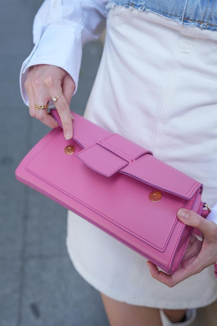 Make a bold fashion statement with the "Fuchsia Clamshell Rectangle Bag" from Lunarity Garage. This vibrant and eye-catching accessory features a sleek rectangular design in a striking fuchsia color, adding a pop of color and personality to your ensemble. The fuchsia hue exudes confidence and energy, making it a perfect choice for those who love to stand out. Crafted with meticulous attention to detail, this bag offers both style and functionality. The unique clamshell closure adds a modern and Pink Rectangular Box Bag For Daily Use, Luxury Pink Square Box Bag, Pink Rectangular Shoulder Bag, Rectangular Pink Shoulder Bag, Pink Mobile Phone Bag In Rectangular Shape, Pink Mobile Phone Bag In Rectangular Case, Modern Pink Shoulder Bag With Mobile Phone Pocket, Chic Pink Mobile Phone Bag, Pink Rectangular Case Box Bag For Shopping