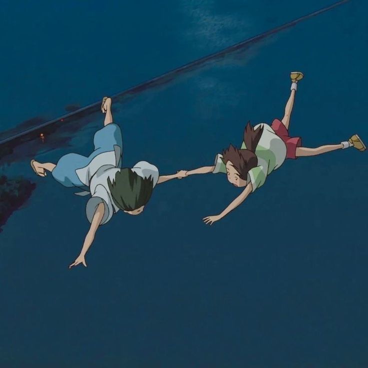 two people are floating in the water with their feet on each other's legs