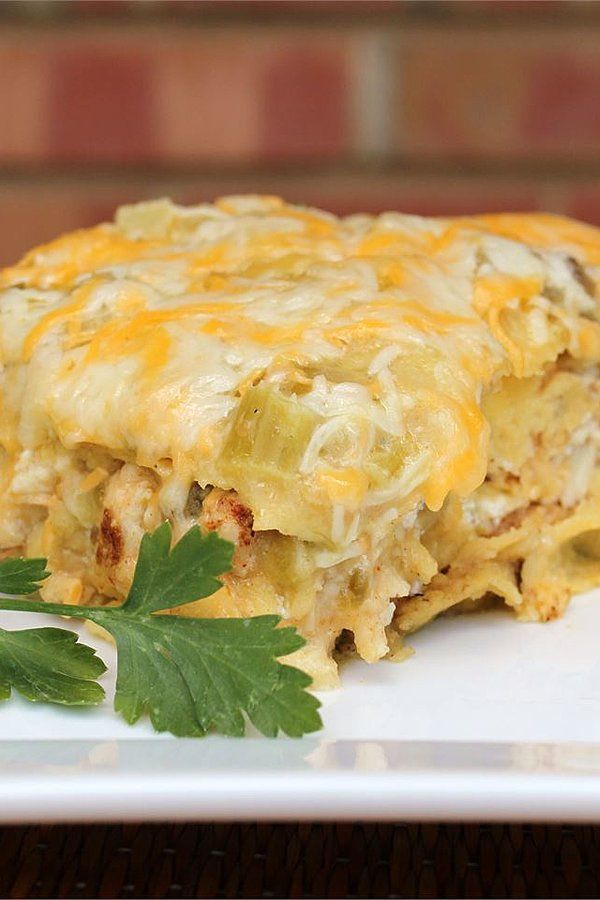 a close up of a plate of food with broccoli and cheese on it