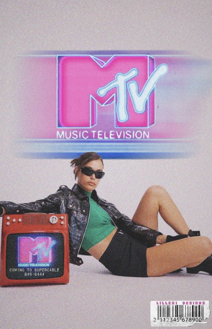 a woman laying on the ground next to an old tv