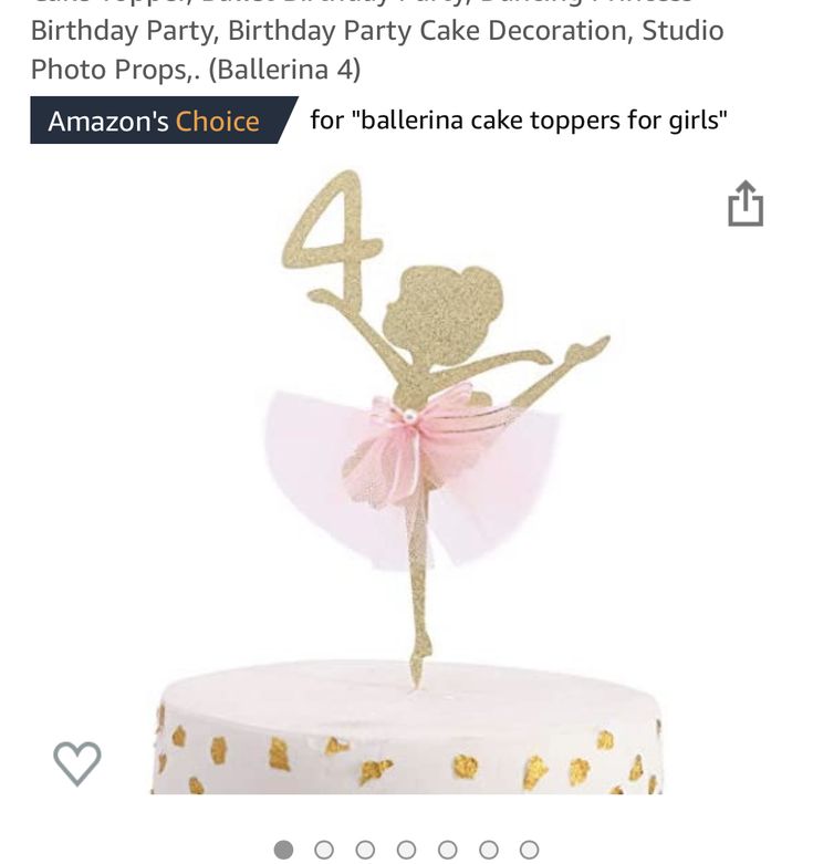 a birthday cake topper with the number four on it and a pink ballerina figure