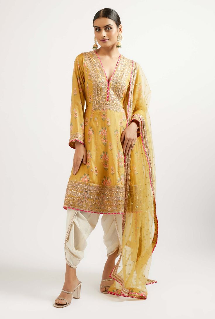 Ekta Mustard Floral Dhoti Set by Gopi Vaid, available on Indiaspopup.com Dhoti Kurta Designs Women, Gold Chikankari Embroidery Slub Silk Traditional Wear, Gold Slub Silk Traditional Wear With Chikankari Embroidery, Yellow Slub Silk Salwar Kameez With Dori Work, Yellow Chikankari Embroidery Raw Silk Salwar Kameez, Gold Slub Silk Salwar Kameez With Resham Embroidery, Gold Cotton Silk Kurta With Chikankari Embroidery, Yellow Raw Silk Salwar Kameez With Chikankari Embroidery, Gold Salwar Kameez With Resham Embroidery In Slub Silk