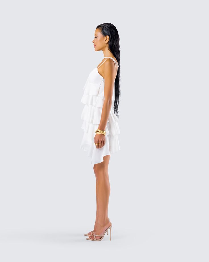 Show off all of your layers in this ivory tiered ruffle dress 🤍 Made from georgette fabric and complete with an A-line design and invisible zipper - this simple yet playful look is perfect for all of your rendezvous 😏 Chic Layered Tiered Ruffle Dress, White Tiered Dress With Ruffles For Summer, Tiered Dress With Ruffled Skirt For Brunch, Tiered Ruffle Dress With Layered Hem For Brunch, Chic Layered Ruffle Dress With Tiered Skirt, Chic Layered Tiered Skirt Ruffle Dress, Layered Hem Ruffle Dress For Brunch, Chic Layered Tiered Dress, White Tiered Dress With Ruffles