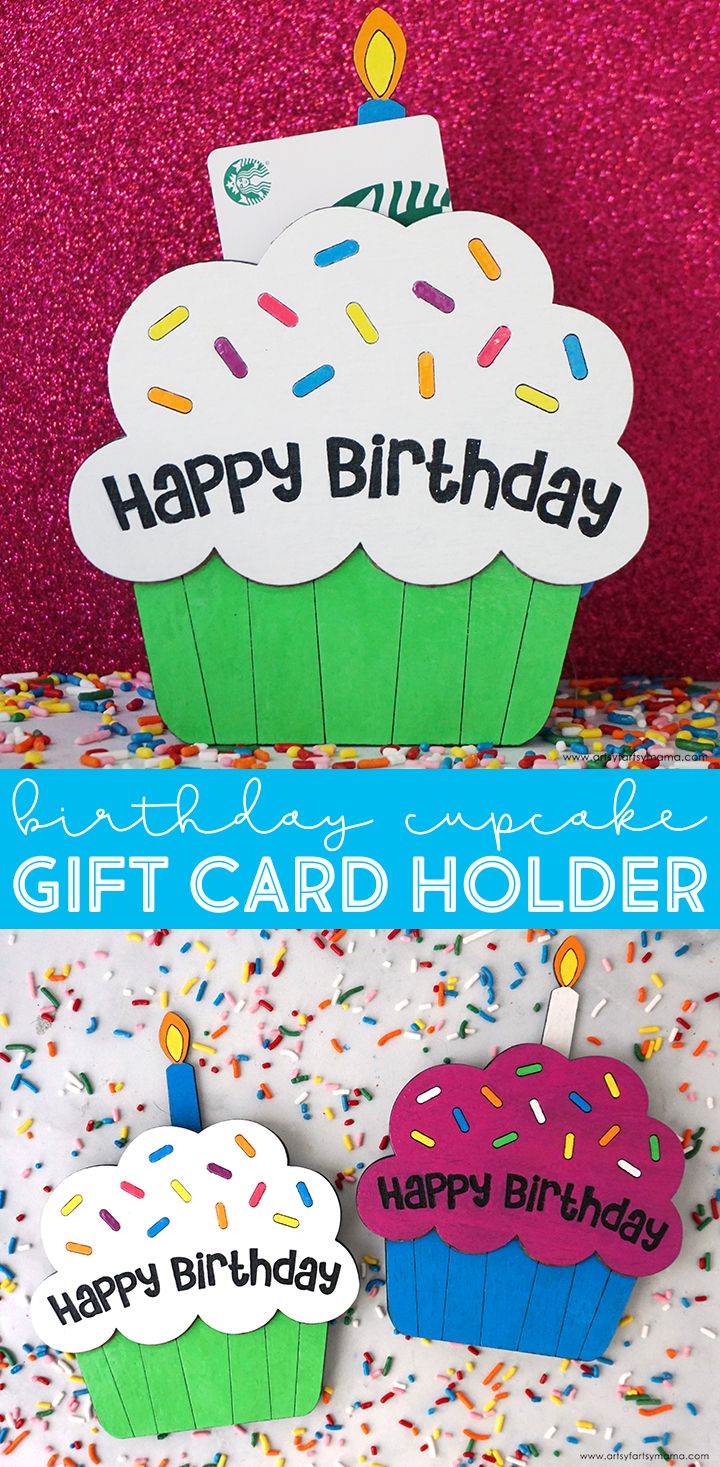 two cupcakes with birthday candles on them are next to a happy birthday card holder