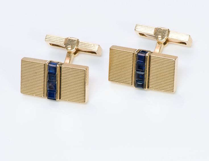 Created with Shogun. Tiffany Co. Sapphire Cufflinks. Vintage Tiffany Co. 14K yellow gold sapphire cufflink and stud set. Approximate Measurements: Length: 0.9" Width: 0.8" Weight: 26.8 Grams. Tiffany & Co. Cufflinks Luxury Vintage Cufflinks For Collectors, Luxury Vintage Cufflinks For Anniversary, Luxury Antique Cufflinks As Gift, Vintage Yellow Gold Business Jewelry, Vintage Yellow Gold Jewelry For Business, Yellow Gold Vintage Jewelry For Business, Hallmarked 14k Gold Cufflinks For Business, 14k Yellow Gold Cufflinks For Anniversary, 14k Yellow Gold Hallmarked Cufflinks