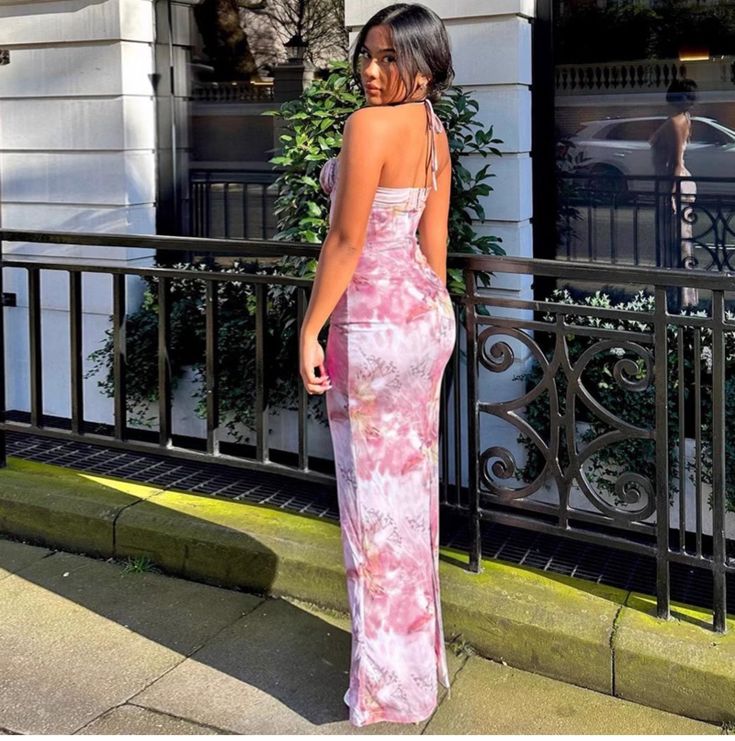 Get ready to turn heads in the Alexia Corset Maxi Dress! This stunning dress in pink features a sleeveless design with a strappy halterneck, high waist, and bodycon fit. The retro pastel tie-dye print adds a touch of elegance and romance. Part of the Good Girl Things Spring-Summer Collection, this dress is perfect for those who want to make a stylish statement. Details Alexia Corset Maxi Dress in Pink Sleeveless Strappy Halterneck High Waist Bodycon Retro Pastel Tie-Dye Print Elegant, Stylish, Romantic Good Girl Things Spring-Summer Collection Pink Stretch Backless Halter Dress, Pink Backless Maxi Dress For Summer, Summer Pink Backless Maxi Dress, Fitted Pink Halter Dress For Summer, Pink Fitted Maxi Dress With Spaghetti Straps, Pink Bodycon Backless Maxi Dress, Pink Halter Neck Bodycon Dress, Pink Backless Halter Dress For Summer, Pink Bodycon Halter Neck Dress