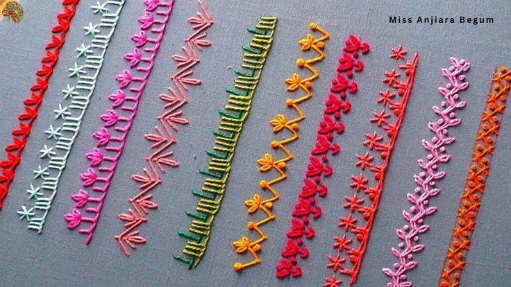 many different colored hair clips on a gray surface with words written in the middle and below them