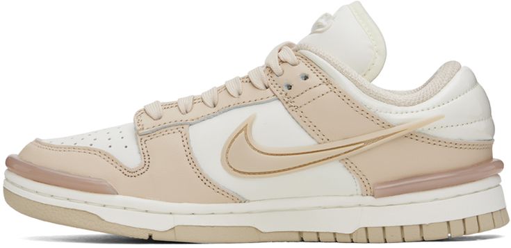 Low-top paneled grained leather sneakers in beige and off-white. · Rubber trim at toe and heel counter · Perforated detailing at toe · Lace-up closure · Rubberized logo patch at padded tongue · Padded collar · Rubberized swoosh appliqué at sides · Quilted panel at heel tab · Mesh lining · Foam rubber midsole · Treaded rubber outsole Please note that this item may be shipped only within North America. Supplier color: Sail/Sanddrift/Pink Nike Cream Low-top Sneakers, Beige Low-top Skate Shoes With Gum Sole, Cream Sneakers With Round Toe, Cream Sneakers With Round Toe And Medium Fit, Cream Leather Skate Shoes For Sports, Beige Nike Sneakers With Rubber Sole, Nike Beige High-top Sporty Sneakers, Sporty Beige Leather Skate Shoes, Nike Low-top Sneakers With Contrasting Heel Counter