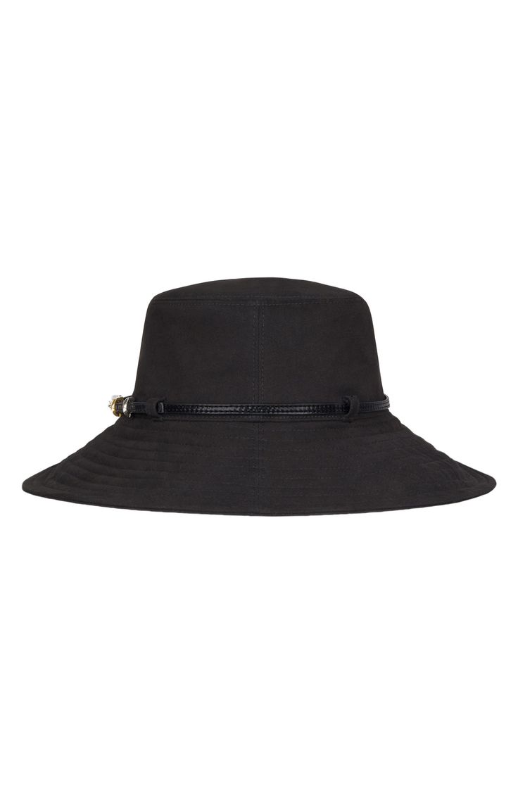 A wider-than-average brim and an adjustable chin strap add extra coverage, a secure fit and easy transport to this bucket hat from Givenchy's Voyou collection. Drawcord-adjustable chin strap 100% cotton Dry clean Made in Italy Adjustable Curved Brim Cloche Hat For Travel, Adjustable Cloche Hat With Curved Brim For Travel, Black Brimmed Bucket Hat For Travel, Adjustable Wide Brim Cloche Hat For Travel, Adjustable Flat Brim Cloche Hat For Outdoor, Everyday Adjustable Wide Brim Cloche Hat, Adjustable Cloche Hat With Flat Brim For Outdoor, Classic Black Adjustable Bucket Hat, Classic Adjustable Black Bucket Hat