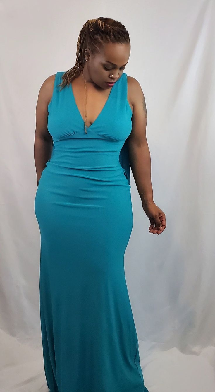 It's gorgeous yall! Definitely giving spring & summer vibes. Ideal for a special date night, formal event, wedding, etc. Two words came to mind when we selected this dress...elegant & classy. She's such a vibe already, you can go light on any accessories. Draped goddess open back maxi Moderate stretch Professional clean or gentle wash & air dry Fabric is polyester, lurex and spandex Model is 5'8", size small Chic V-neck Evening Dress For Date Night, Chic Sleeveless Dress For Prom Season, Chic Sleeveless Dress For Prom, Chic V-neck Prom Evening Dress, Elegant V-neck Midi Dress For Prom, Elegant Sleeveless Dress For Prom Night Out, Elegant V-neck Summer Evening Dress, Elegant Sleeveless Dress With Fitted Bodice For Date Night, Elegant Maxi Dress For Prom