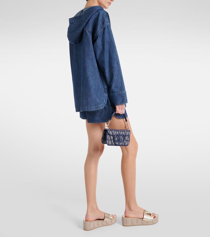 Denim chambray hoodie in blue - Valentino | Mytheresa Denim Hoodie With Pockets, Denim Hooded Hoodie With Pockets, Hooded Cotton Denim Jacket With Pockets, Hooded Denim Hoodie With Pockets, Hooded Dark Wash Cotton Denim Jacket, Denim Blue Hoodie With Pockets, Trendy Denim Hoodie With Pockets, Long Sleeve Denim Hoodie With Pockets, Denim Hoodie With Pockets In Medium Wash