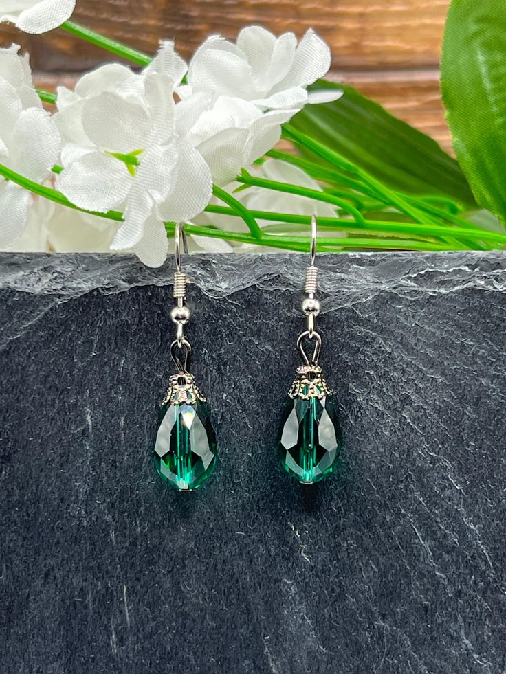 Upgrade your everyday look with these handmade Green Teardrop Earrings. These simple yet stylish earrings feature a stunning teardrop shape in a vibrant shade of green, adding a pop of color to any outfit. Whether you're headed to the office or meeting up with friends, these earrings are the perfect accessory for every day. The high-quality craftsmanship ensures durability, while the lightweight design offers comfort all day long. Elevate your style effortlessly with these Green Teardrop Earrings. Message me for more accurate measurements of this product. Green Teardrop Drop Earrings Nickel Free, Green Nickel-free Teardrop Drop Earrings, Green Nickel-free Teardrop Earrings, Handmade Green Teardrop Earrings, Green Teardrop Earrings For Jewelry Making, Green Teardrop Drop Earrings For Jewelry Making, Green Drop Earrings Hypoallergenic, Nickel-free Green Teardrop Pendant Earrings, Green Drop Hypoallergenic Earrings