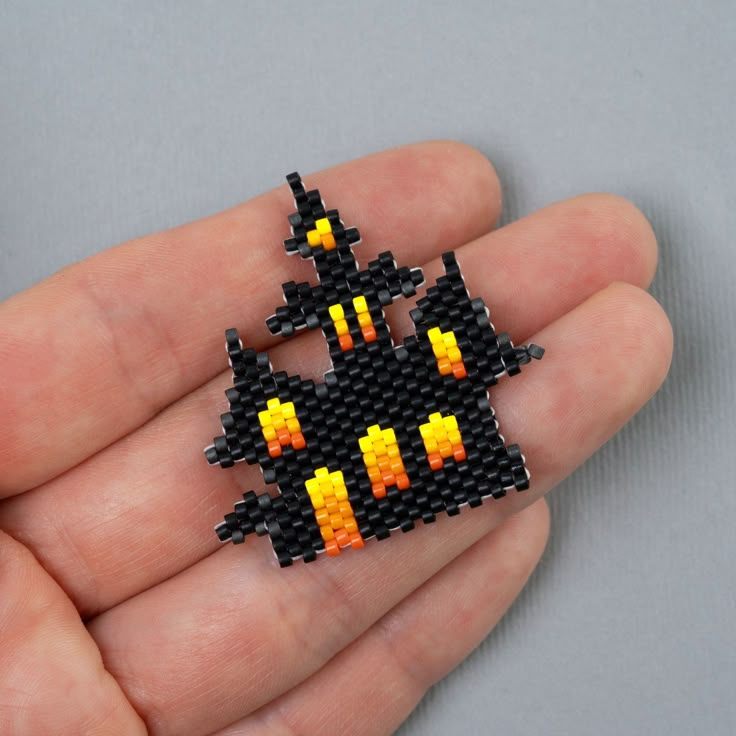 Beaded Castle. #miyukipattern #brickstitch #beading #beadpattern #castle #beadedcastle #beadedjewelry #бисероплетение #кирпичноеплетение #миюки Seed Bead Halloween Jewelry, Halloween Beadwork, Halloween Beading, Beaded Halloween, Halloween Beaded Jewelry, Miyuki Bead, Diy Seed Bead Earrings, Seed Bead Crafts, Bead Weaving Tutorials