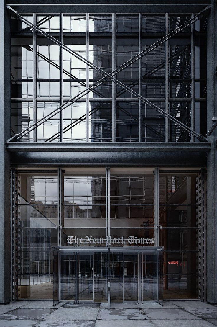 the new york times building is shown in black and white, with scaffolding around it