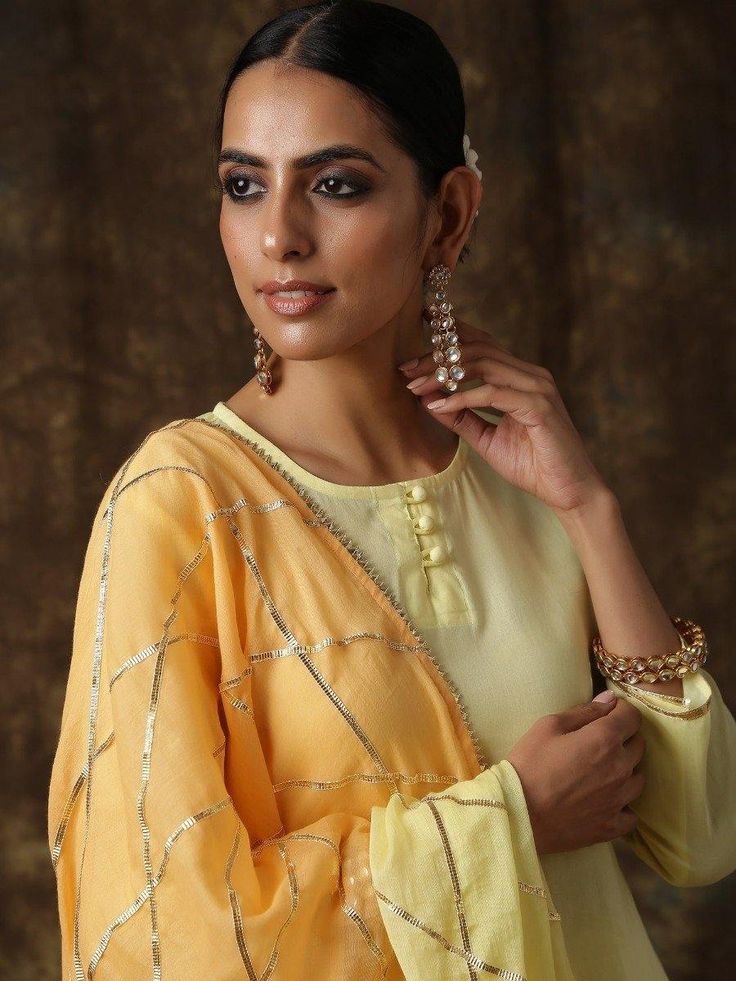 Ambika- Amaltas yellow-light orange sharara set - Trendroots Orange Sharara, Potli Button, Yellow Kurta, Kurta Sharara Set, Kurta Sharara, Gota Work, A Line Kurta, Sharara Set, Light Orange