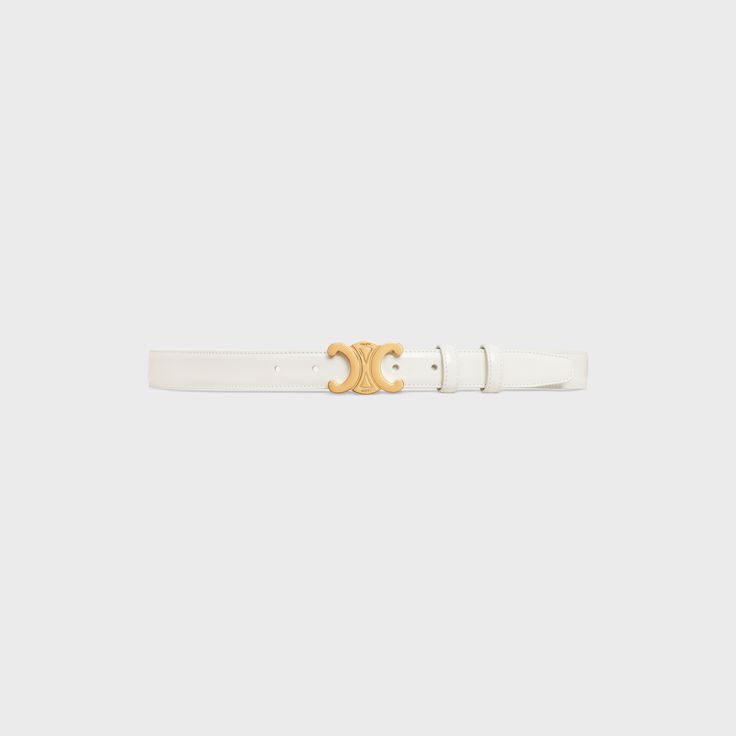 MEDIUM TRIOMPHE BELT IN TAURILLON LEATHER - WHITE | CELINE Designer White Leather Belts, Designer White Belts For Formal Occasion, Designer White Belt For Formal Occasions, Modern White Formal Belt, Elegant White Belt Buckle, Modern White Belt For Formal Occasions, Elegant White Leather Belt, Canvas Messenger Bag, Fragrance Collection