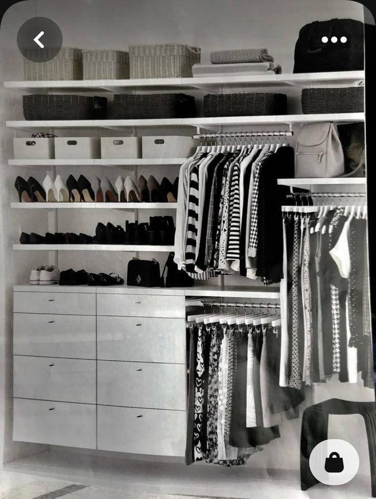 an open closet filled with lots of clothes and shoes