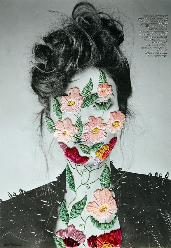 a woman with flowers painted on her face