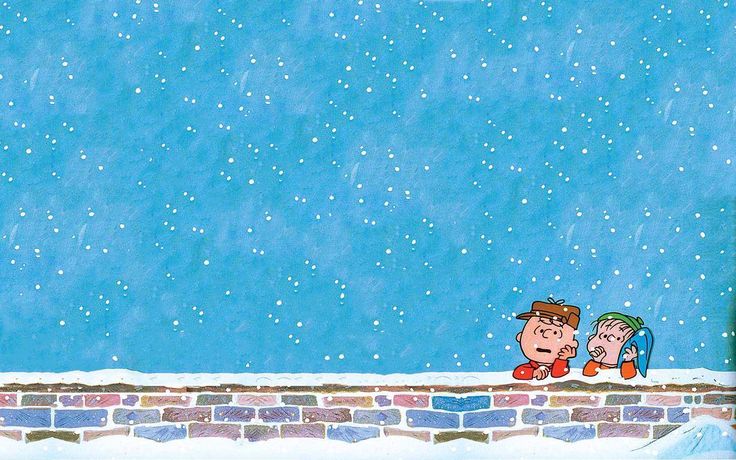 two children are sitting on the edge of a wall in front of snow and stars