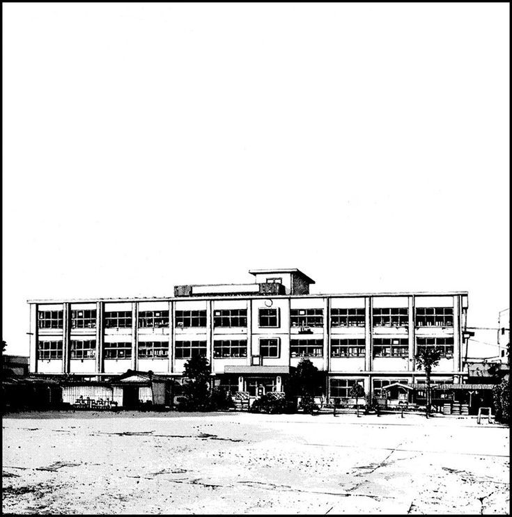 an old black and white photo of a large building with lots of windows on it