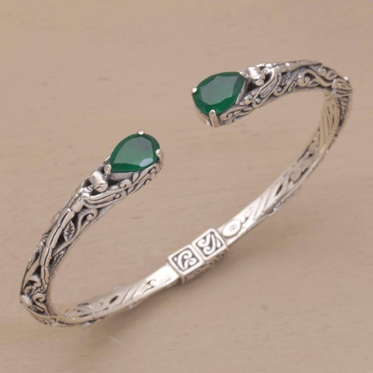 Mesmerized, two sparkling gemstones reach toward one another in an expression of love. Ornate sterling silver becomes an exquisite bracelet with a hinge at the back. From Komang Wijayana, the cuff culminates in green quartz teardrops that total 2.5 carats. Silver Bracelet Designs, Inexpensive Jewelry, Womens Silver Jewelry, Antique Silver Jewelry, Silver Jewellery Indian, Silver Bracelets For Women, Jewelry Bracelets Silver, Gold Bangles Design, Women Bracelet