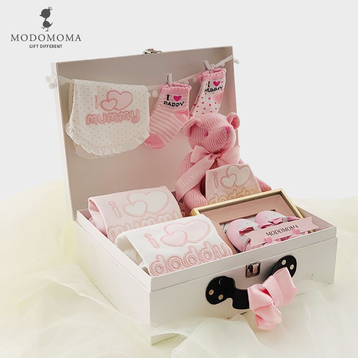 a white box with pink items in it