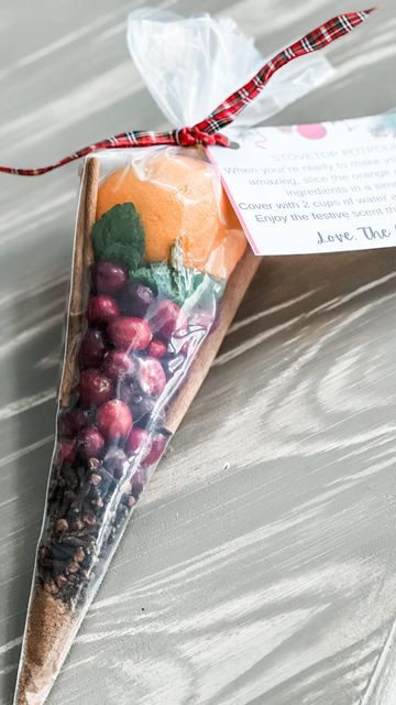 a bag filled with fruits and vegetables on top of a table