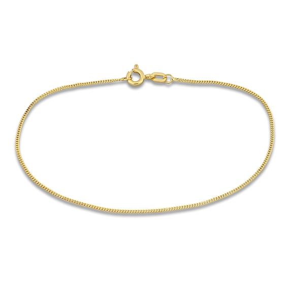 Timeless 1mm curb links adjoin elegantly around the length of this gorgous women's bracelet. 14K Yellow Gold The 8-inch bracelet secures with a spring ring clasp. Classic Gold Jubilee Bracelet With Snake Chain, Yellow Gold Snake Chain Bracelet With Adjustable Chain, Dainty Yellow Gold Chain Bracelet With Curb Chain, Dainty Yellow Gold Curb Chain Bracelet, Classic Yellow Gold Bracelet With Snake Chain, Flexible Yellow Gold Snake Chain Bracelet, Elegant Gold Snake Chain Bracelet With Lobster Clasp, Classic Yellow Gold Snake Chain Bracelet, Yellow Gold Snake Chain Bracelet