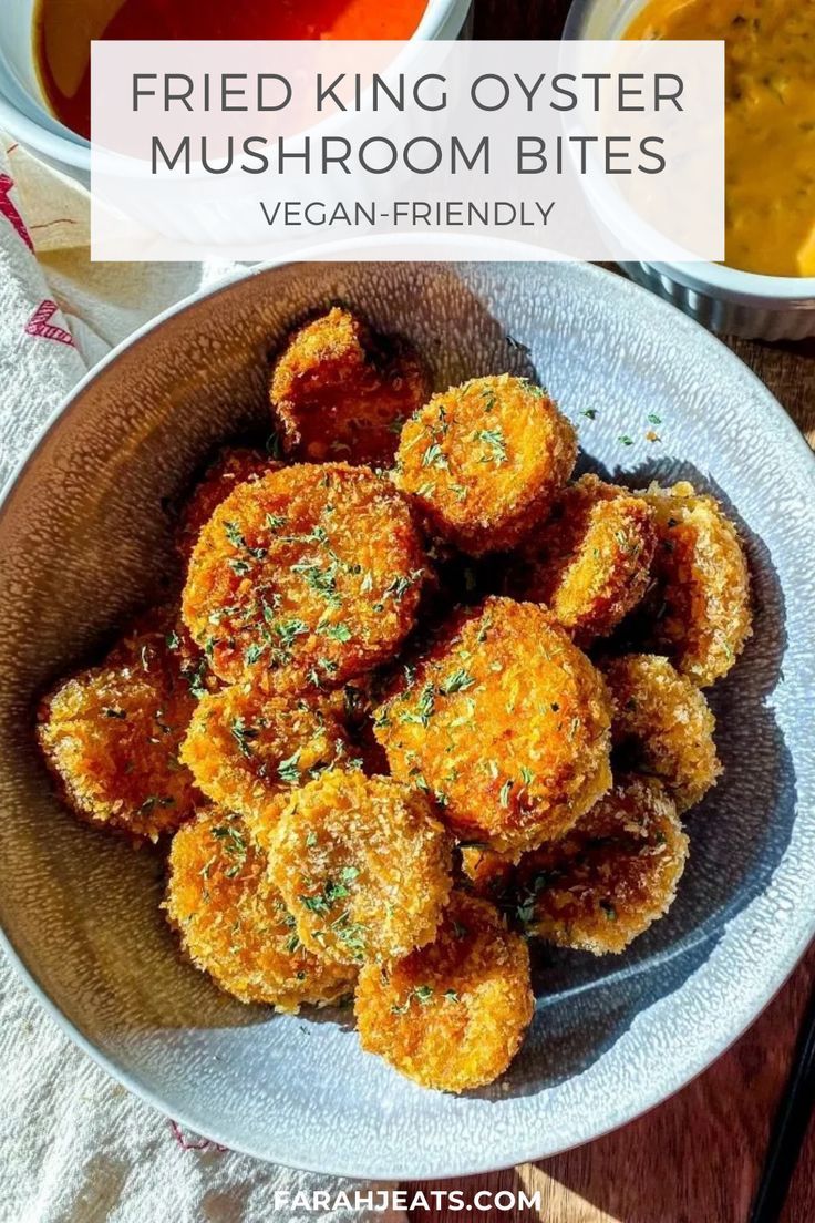 fried king oyster mushrooms in a bowl with dipping sauce on the side and text overlay that reads, fried king oyster mushrooms vegan - friendly