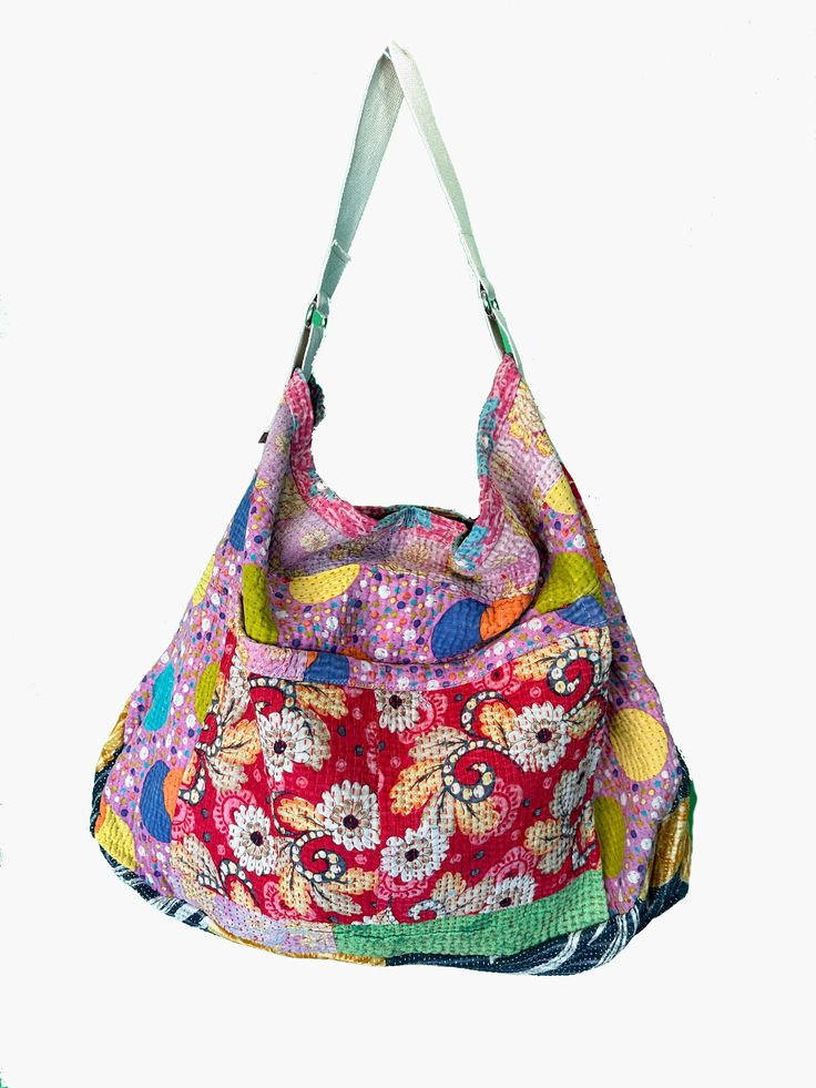 Voluminous enough to hold all your necessities our vintage Kantha Beach Bazaar Bag is the perfect companion for a day at the beach, strolling through the farmer’s market, sleepovers and of course, travel. Twisted Guru Bazaar Bags come in a wide variety of prints and patterns making accessorizing your outfit easy and fun! Product Details: Handcrafted One-of-a-Kind Multi Patterns. Two-(2) handbags are cut from the same cloth. They are similar but different, so please note that your handbag may be Multicolor Rectangular Hobo Bag For Vacation, Multicolor Shoulder Bag With Removable Pouch For Beach, Multicolor Large Capacity Hobo Bag For Beach, Eco-friendly Multicolor Festival Bag, Pink Tote Hobo Bag For Vacation, Multicolor Hobo Tote Bag For Beach, Bohemian Large Capacity Beach Bag For Market, Multicolor Hobo Bag With Removable Pouch For Vacation, Colorful Bohemian Beach Bag For Everyday Use