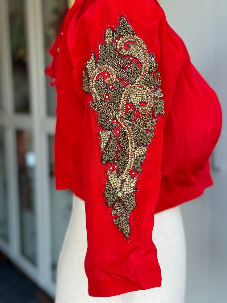 This red designer blouse is perfect for special occasions. Embroidered with intricate details, it's designed to add a touch of elegance to your ensemble. Perfect for pairing with a saree, it's sure to become an instant favorite. size 38-42 Red Designer Blouse, Blouse Saree, Designer Blouse, Designer Blouses, Choker Necklaces, Saree Blouse, Intricate Details, Blouse Designs, Choker