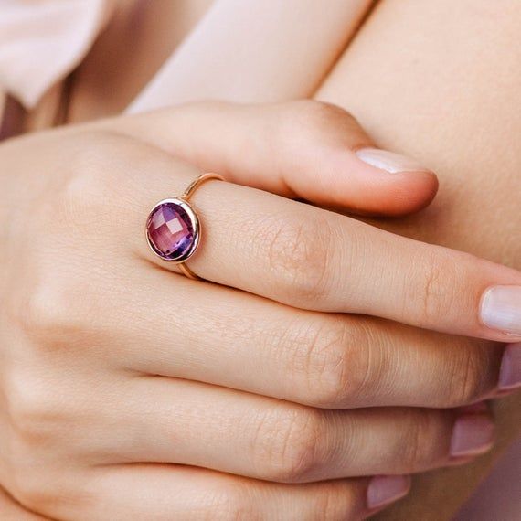 Amethyst ring in 14K solid gold. A gold stacking ring with a natural amethyst gemstone. A perfect gold ring for women who love colors and elegant jewelry. And, note; purple amethyst is the birthstone of February. The best gift for her.100% handcrafted with love!D E T A I L S● Metal: 14K solid gold, 14K white gold or 14K rose gold● Gemstone: Purple Amethyst, briolette cut● Stone Diameter: 10mm (0.5in)R I N G ∙ S I Z I N GFor General Reference:● we use standard US Ring Sizing● an average women's r Rose Gold Amethyst Ring With Birthstone Detail, Rose Gold Amethyst Ring With Birthstone, Round Amethyst Birthstone Ring In Fine Jewelry Style, Faceted Amethyst Ring In Yellow Gold, Faceted Yellow Gold Amethyst Ring, Round Amethyst Birthstone Ring In Yellow Gold, Gift Yellow Gold Amethyst Ring With Bezel Setting, Faceted Topaz Ring In 14k Gold, Yellow Gold Amethyst Ring With Bezel Setting Gift