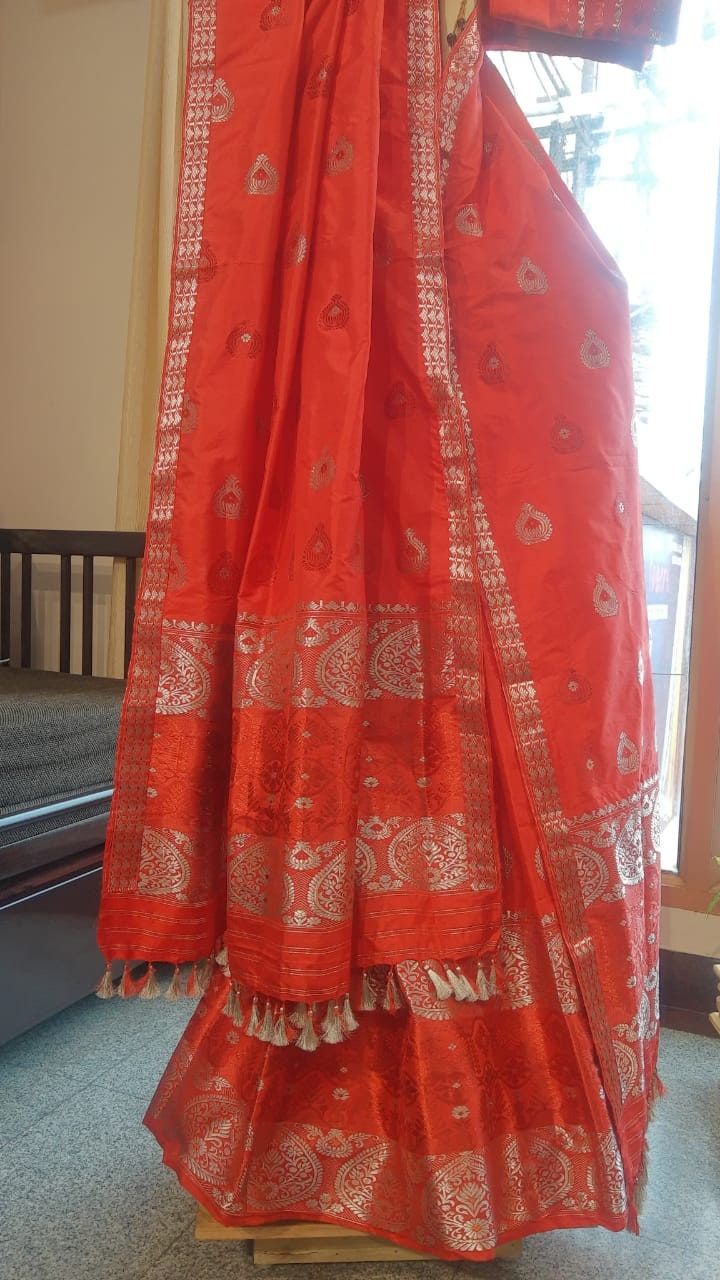 Welcome to our shop, where we take pride in offering you the finest craftsmanship and exquisite textiles. Introducing our pure Muga silk Mekhela Chador, a timeless masterpiece that beautifully combines tradition and elegance. Handwoven with care and precision, this Mekhela Chador is crafted from pure Muga silk, sourced from the silkworm Antheraea assamensis, which is indigenous to Assam, India. Muga silk is known for its lustrous golden hue, unparalleled sheen, and incredible durability. It is c Traditional Pre-draped Saree With Cutdana For Festivals, Traditional Handloom Pre-draped Saree For Diwali, Traditional Tussar Silk Pre-draped Saree, Traditional Art Silk Pre-draped Saree For Diwali, Traditional Pre-draped Saree For Ceremonies, Festive Pre-draped Saree With Traditional Patterns, Festive Tussar Silk Pre-draped Saree With Traditional Patterns, Traditional Banarasi Silk Pre-draped Saree For Diwali, Navratri Dola Silk Pre-draped Saree With Traditional Patterns