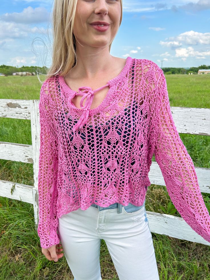 The perfect top for a festival, swim cover up or everyday wear! Pink crochet with tie on the chest slightly cropped TTS, model is wearing a size small and is 5' 7" and normally a size 2/4 Spring Festival Crochet Lace Cover-up, Bohemian Open Knit Crop Top, Spring Crochet Lace Crop Top For Beach, Spring Casual Crochet Lace Cover-up, Casual Crochet Lace Cover-up For Spring, Crochet Lace Crop Top For Beach And Spring, Casual Crop Top Beach Cover-up For Spring, Casual Crop Top For Spring Beach Cover-up, Casual Spring Crop Top For Beach Cover-up