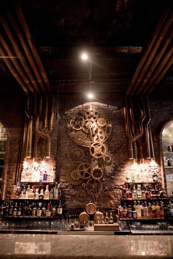 a bar with a large clock on the wall