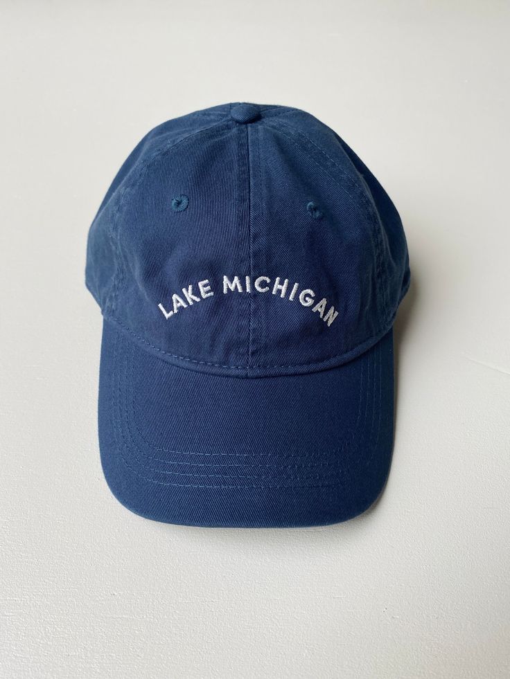 Designed by our own Frances Jaye team member, Tyler, this "Dad Hat" is a classic. The vintage denim color is sure to match every outfit all year round. Embroidered locally in Grand Rapids. Regular fit 100% Cotton Hand wash Casual Dark Wash Short Brim Hat, Classic Summer Hats With Embroidered Logo, Classic Summer Hat With Embroidered Logo, Vintage Blue Cotton Baseball Cap, Casual Cotton Hat With Curved Brim, Vintage Cotton Dad Hat Embroidered, Vintage Cotton Dad Hat With Flat Brim, Vintage Embroidered Cotton Dad Hat, Vintage Cotton Embroidered Dad Hat