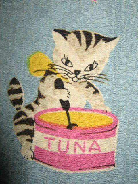 an image of a cat that is holding a bucket with tuna in it's mouth