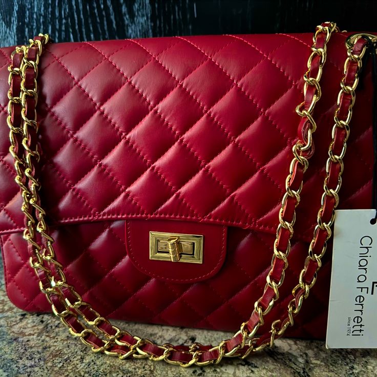 This Is A Chiara Ferretti Red Quilted Florence Bag Made In Italy. It Is A Crossbody/Shoulder Bag. Chic Red Flap Bag With Gold-tone Hardware, Red Satchel Shoulder Bag For Evening, Classic Red Flap Bag For Shopping, Chic Red Flap Bag, Red Crossbody Flap Bag For Shopping, Red Evening Shoulder Bag With Detachable Handle, Red Shoulder Bag With Detachable Handle For Evening, Red Flap Bag With Detachable Handle For Travel, Chic Red Satchel For Formal Occasions