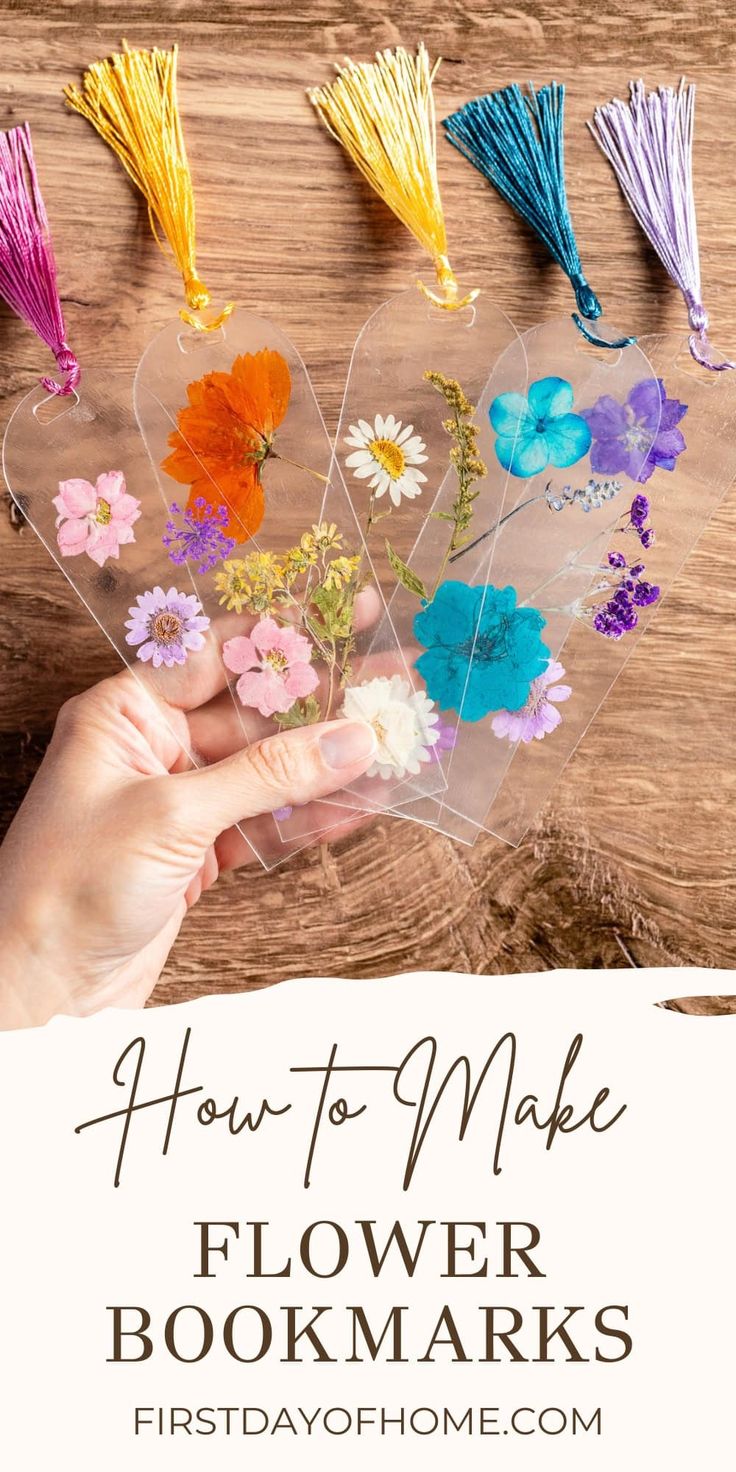 a person holding flowers in their hands with the text how to make flower bookmarks