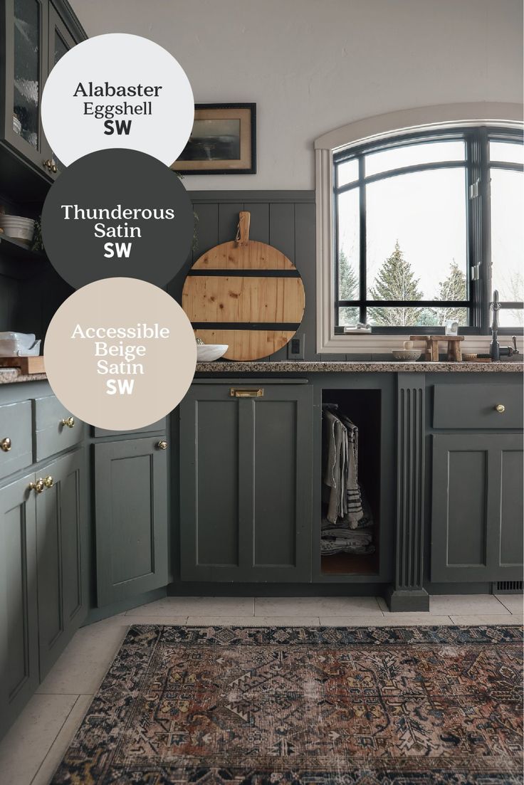 a kitchen with green cabinets and an area rug