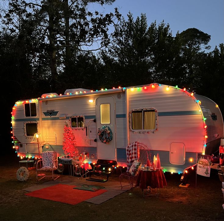 an rv is decorated with christmas lights and holiday decorations for the front door or back yard