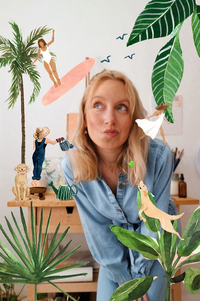 a woman sitting in front of a potted plant and looking up at the camera